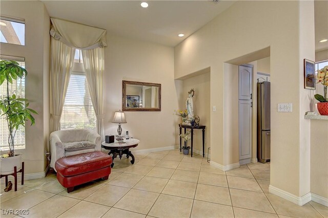 2605 Orchid Valley Dr, Las Vegas, NV 89134 - sitting room with light tile patterned floors, recessed lighting, and a high ceiling