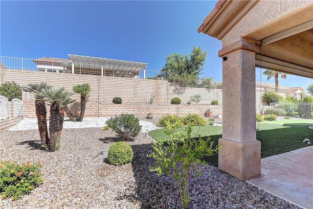 2605 Orchid Valley Dr, Las Vegas, NV 89134 - fenced backyard with a patio area