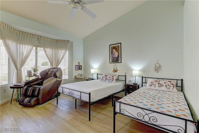 2605 Orchid Valley Dr, Las Vegas, NV 89134 - bedroom featuring multiple windows, light wood-style flooring, ceiling fan, and high vaulted ceiling