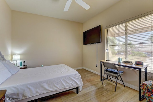 2605 Orchid Valley Dr, Las Vegas, NV 89134 - bedroom featuring light wood finished floors, ceiling fan, and an office area