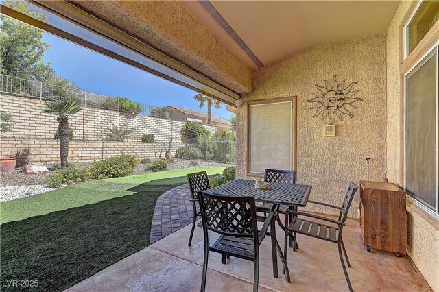 2605 Orchid Valley Dr, Las Vegas, NV 89134 - fenced backyard with a patio and outdoor dining space