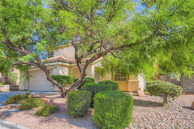 10716 Aire Dr, Las Vegas, NV 89144 - view of front facade with stucco siding and driveway