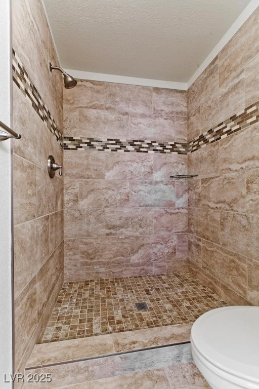 1663 Cloister Ave, Henderson, NV 89014 - bathroom with a tile shower and a textured ceiling