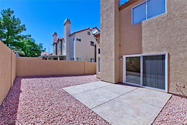 1663 Cloister Ave, Henderson, NV 89014 - fenced backyard with a patio area