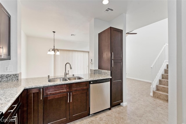 1663 Cloister Ave, Henderson, NV 89014 - kitchen with dishwasher, dark brown cabinetry, light stone counters, and decorative light fixtures