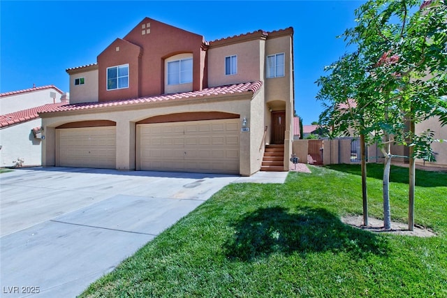 1663 Cloister Ave, Henderson, NV 89014 - mediterranean / spanish home with stucco siding, driveway, a tile roof, and a garage