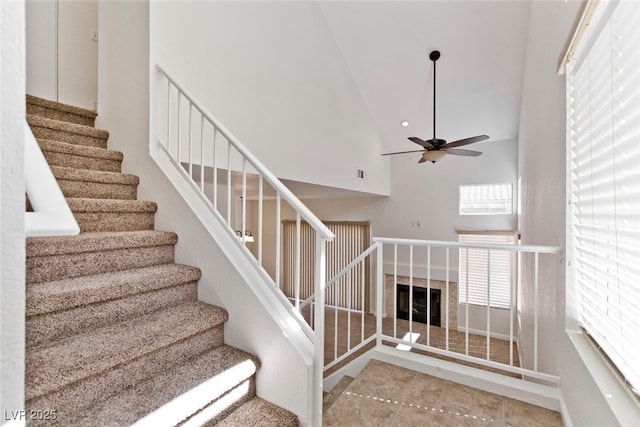 1663 Cloister Ave, Henderson, NV 89014 - stairway with ceiling fan and a high ceiling