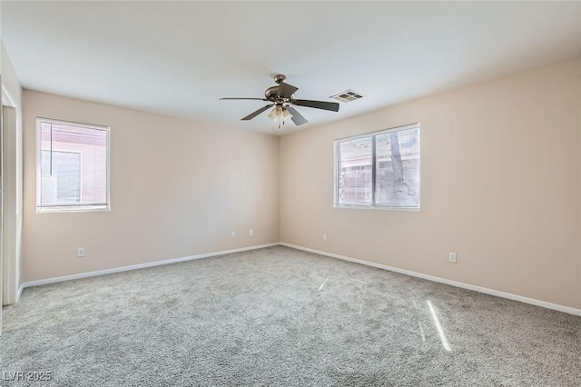 7547 Rolling River Dr, Las Vegas, NV 89131 - spare room featuring carpet, healthy amount of natural light, and ceiling fan