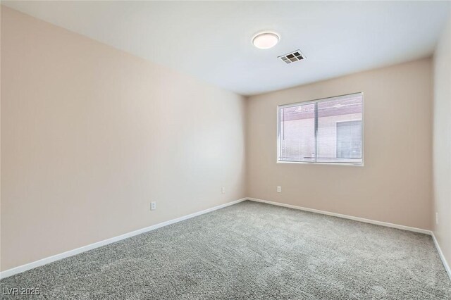 7547 Rolling River Dr, Las Vegas, NV 89131 - carpeted empty room featuring baseboards
