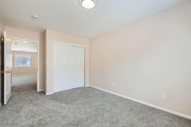 7547 Rolling River Dr, Las Vegas, NV 89131 - unfurnished bedroom featuring carpet flooring and a closet