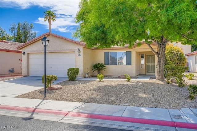 7547 Rolling River Dr, Las Vegas, NV 89131 - view of front of property with an attached garage, stucco siding, and concrete driveway