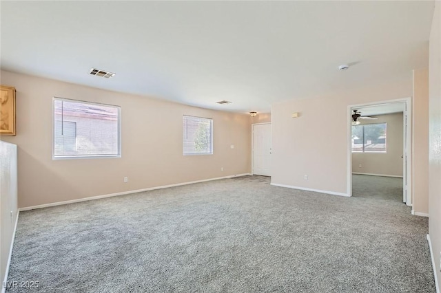 7547 Rolling River Dr, Las Vegas, NV 89131 - unfurnished room featuring carpet flooring, a ceiling fan, and a smoke detector