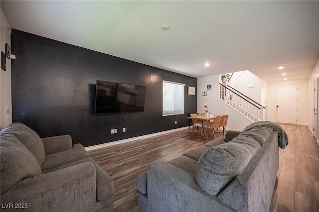 9256 Alden Pointe Ct, Las Vegas, NV 89143 - living area with wood finished floors, stairs, and recessed lighting