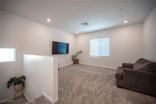 9256 Alden Pointe Ct, Las Vegas, NV 89143 - living area with healthy amount of natural light, carpet, and recessed lighting