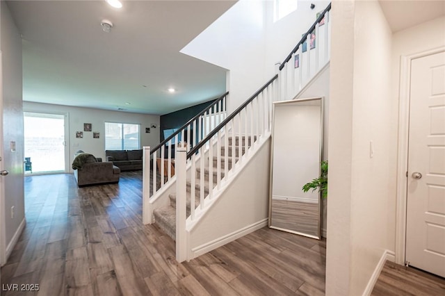 9256 Alden Pointe Ct, Las Vegas, NV 89143 - staircase with wood finished floors and recessed lighting