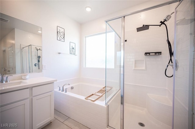 9256 Alden Pointe Ct, Las Vegas, NV 89143 - full bath featuring a stall shower, vanity, a garden tub, and tile patterned floors