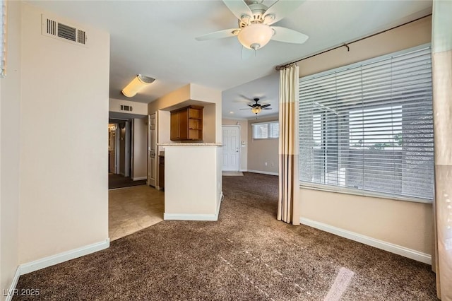 4400 S Jones Blvd Unit 2007, Las Vegas, NV 89103 - unfurnished living room with carpet floors and a ceiling fan