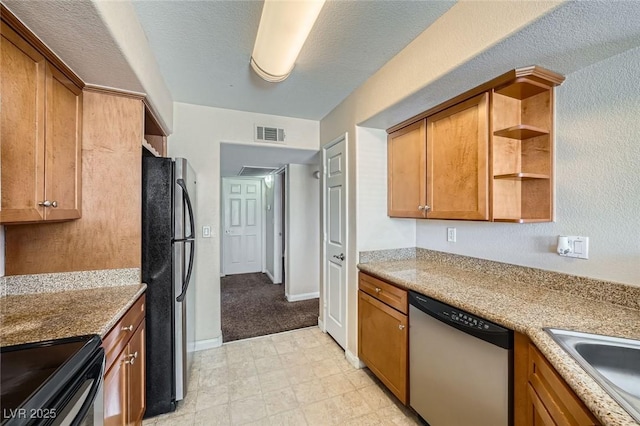 4400 S Jones Blvd Unit 2007, Las Vegas, NV 89103 - kitchen with stainless steel dishwasher, freestanding refrigerator, open shelves, electric stove, and brown cabinetry