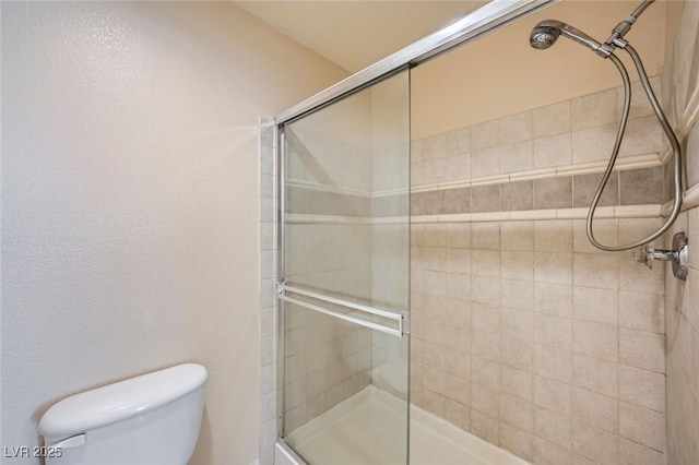 4400 S Jones Blvd Unit 2007, Las Vegas, NV 89103 - full bathroom with a tile shower and toilet