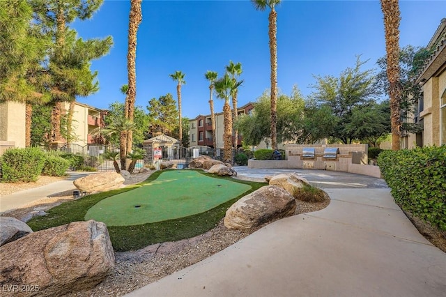 4400 S Jones Blvd Unit 2007, Las Vegas, NV 89103 - view of community with a putting area, exterior kitchen, and a residential view