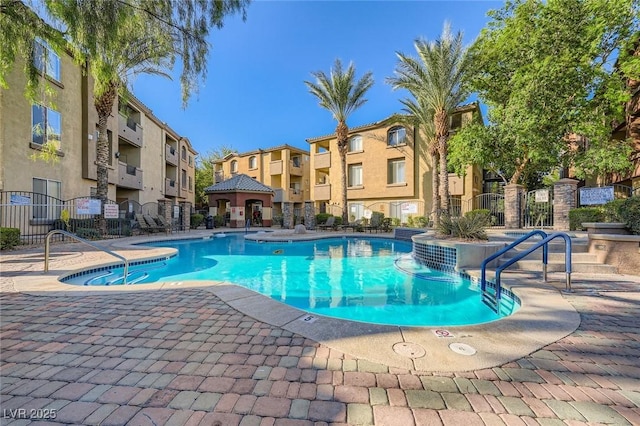 4400 S Jones Blvd Unit 2007, Las Vegas, NV 89103 - community pool with a residential view and a patio area