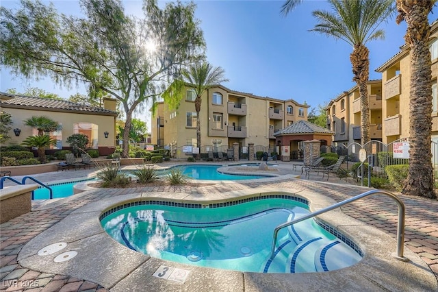 4400 S Jones Blvd Unit 2007, Las Vegas, NV 89103 - community pool with a patio area, a residential view, and a community hot tub