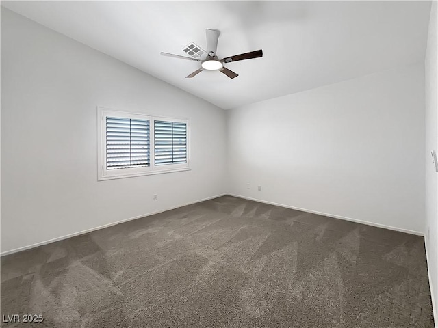 6696 Merced Lake Dr, Las Vegas, NV 89156 - spare room featuring dark colored carpet, lofted ceiling, and a ceiling fan