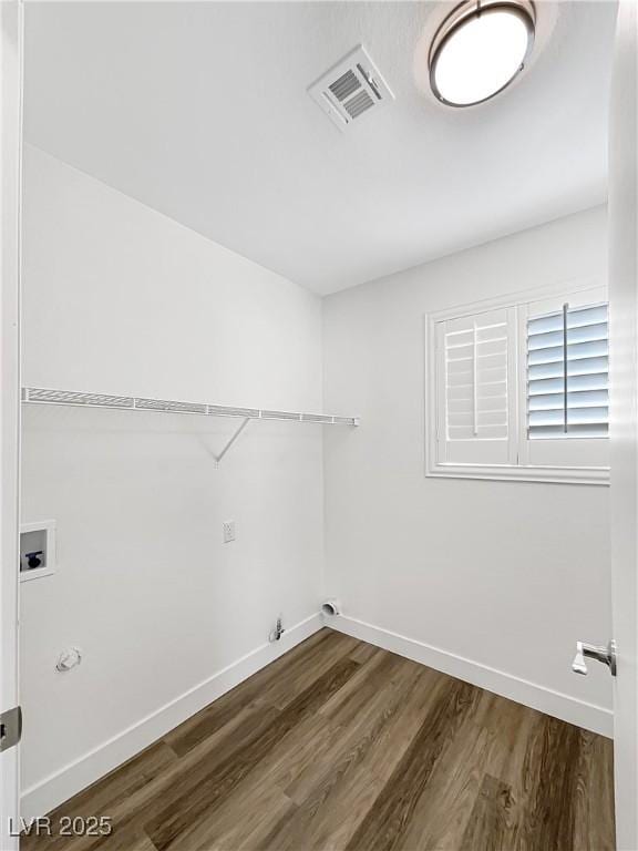 6696 Merced Lake Dr, Las Vegas, NV 89156 - washroom featuring gas dryer hookup, washer hookup, and wood finished floors