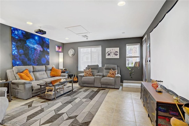 9050 W Tropicana Ave Unit 1027, Las Vegas, NV 89147 - living room featuring light tile patterned flooring, healthy amount of natural light, recessed lighting, and an accent wall