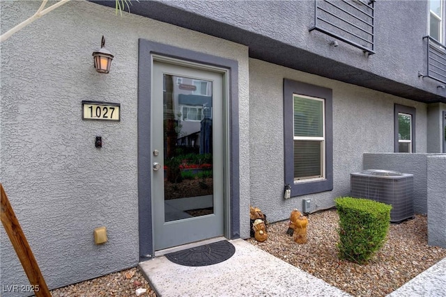 9050 W Tropicana Ave Unit 1027, Las Vegas, NV 89147 - view of exterior entry with stucco siding