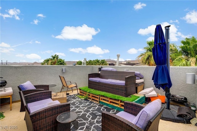9050 W Tropicana Ave Unit 1027, Las Vegas, NV 89147 - view of patio / terrace with an outdoor hangout area