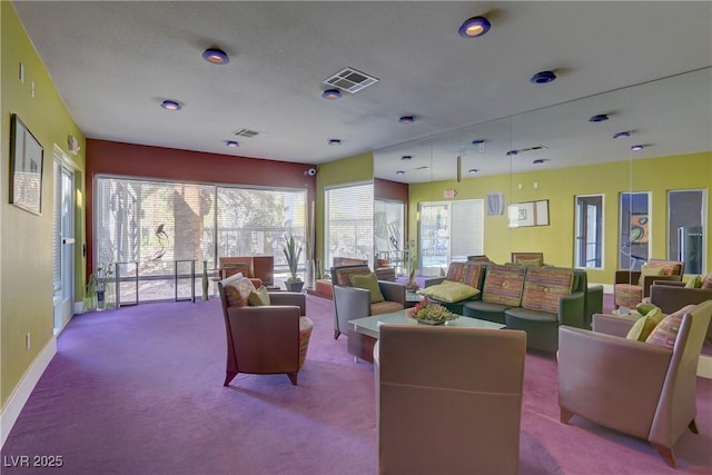 9050 W Tropicana Ave Unit 1027, Las Vegas, NV 89147 - living area featuring carpet floors and baseboards