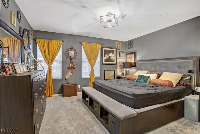 9050 W Tropicana Ave Unit 1027, Las Vegas, NV 89147 - bedroom featuring light carpet and baseboards