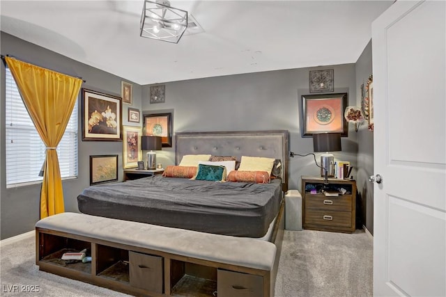 9050 W Tropicana Ave Unit 1027, Las Vegas, NV 89147 - bedroom featuring carpet and baseboards