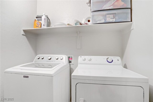 9050 W Tropicana Ave Unit 1027, Las Vegas, NV 89147 - washroom with washer and dryer