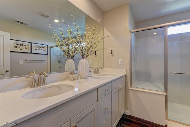 7705 Alder Forest St, Las Vegas, NV 89113 - full bath featuring a stall shower and double vanity