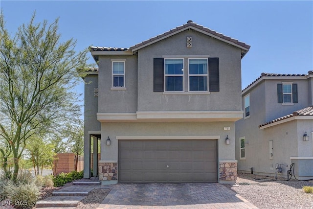 7705 Alder Forest St, Las Vegas, NV 89113 - traditional-style house with stone siding, a garage, and stucco siding