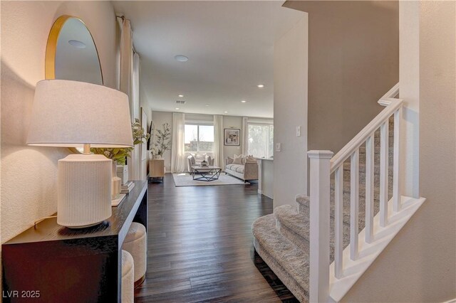 7705 Alder Forest St, Las Vegas, NV 89113 - entrance foyer with stairway, dark wood-style flooring, and recessed lighting