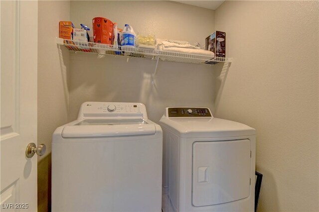 7705 Alder Forest St, Las Vegas, NV 89113 - laundry room with separate washer and dryer
