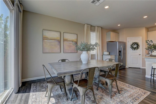 7705 Alder Forest St, Las Vegas, NV 89113 - dining space featuring dark wood-type flooring and recessed lighting
