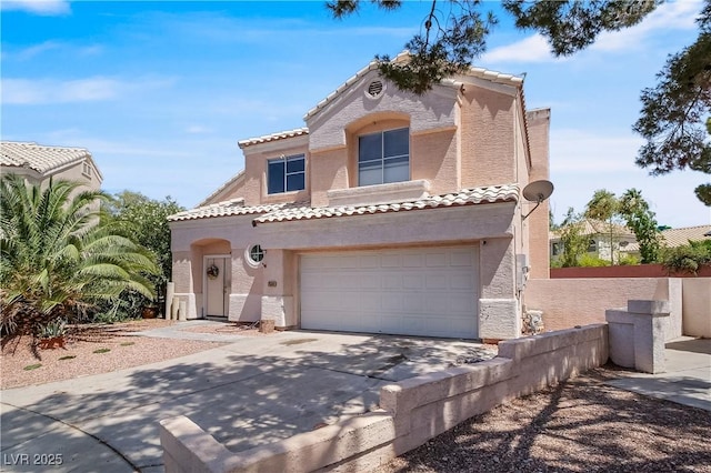 2500 Cortina Ave, Henderson, NV 89074 - mediterranean / spanish house with driveway, a tiled roof, stucco siding, and an attached garage