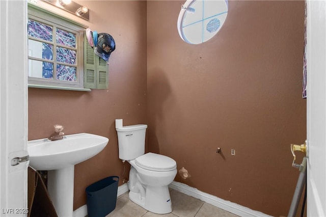 2500 Cortina Ave, Henderson, NV 89074 - half bathroom featuring tile patterned floors and toilet