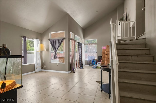 2500 Cortina Ave, Henderson, NV 89074 - entryway with stairway, tile patterned floors, and high vaulted ceiling
