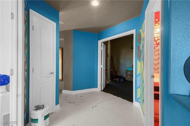 2500 Cortina Ave, Henderson, NV 89074 - corridor with finished concrete flooring and baseboards