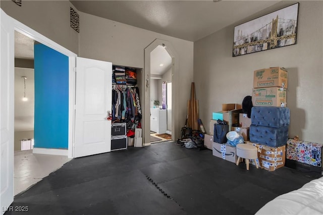 2500 Cortina Ave, Henderson, NV 89074 - bedroom featuring arched walkways and ensuite bathroom