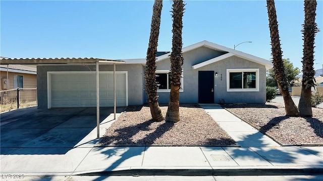4238 Boratko St, Las Vegas, NV 89115 - single story home featuring stucco siding, an attached garage, and concrete driveway