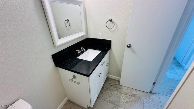 4238 Boratko St, Las Vegas, NV 89115 - bathroom with vanity and a textured wall