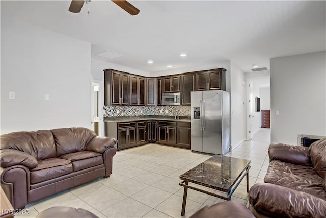 6489 Crest Estates St, Las Vegas, NV 89131 - living area with light tile patterned floors, ceiling fan, and recessed lighting