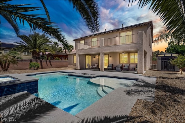 6489 Crest Estates St, Las Vegas, NV 89131 - view of pool with a fenced backyard, outdoor lounge area, a patio area, and a pool with connected hot tub