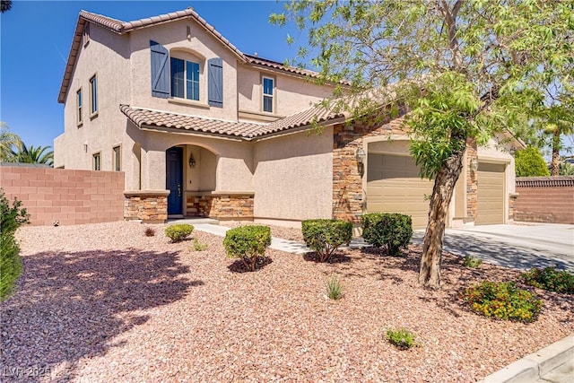6489 Crest Estates St, Las Vegas, NV 89131 - mediterranean / spanish-style home featuring stucco siding, stone siding, a tiled roof, concrete driveway, and an attached garage